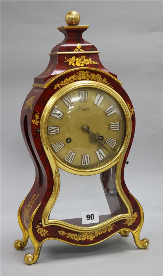 A painted and gilt mantel clock